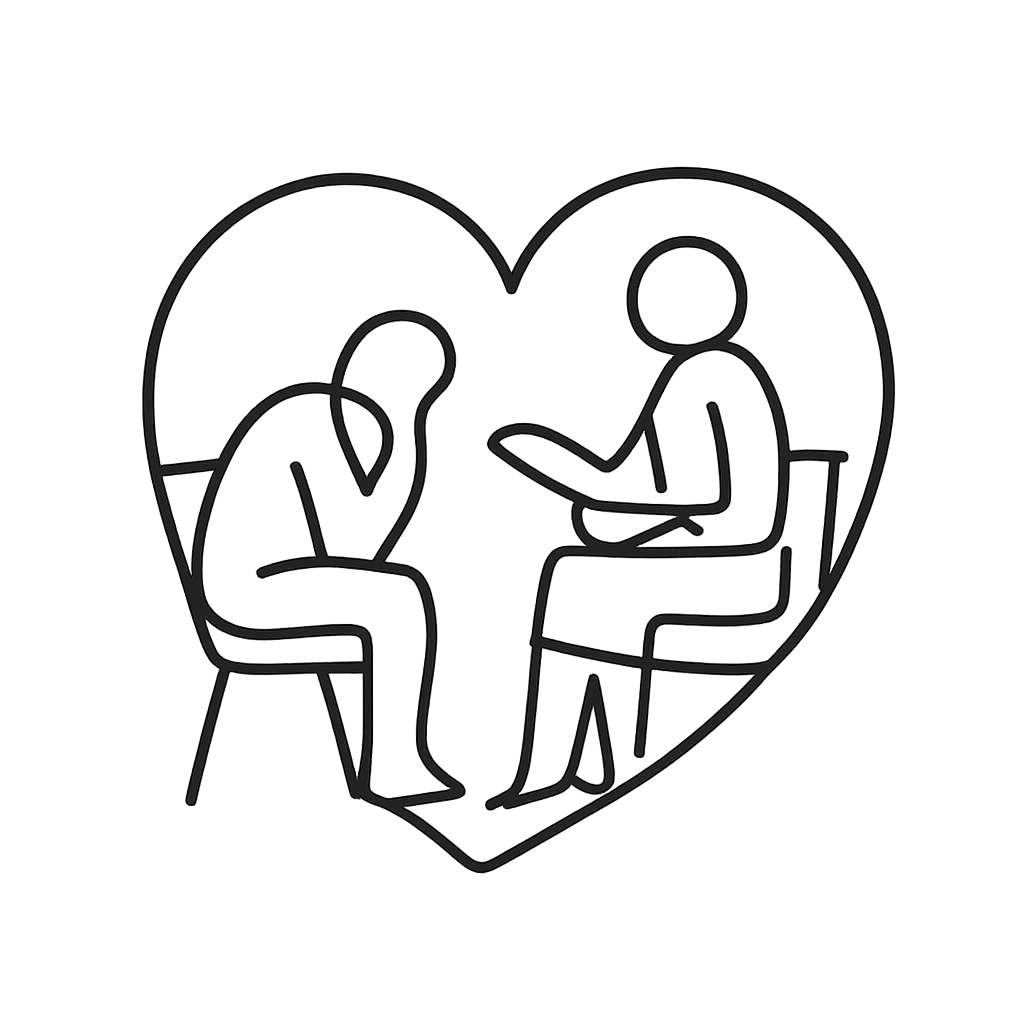 Two people sitting in chairs in the shape of a heart.